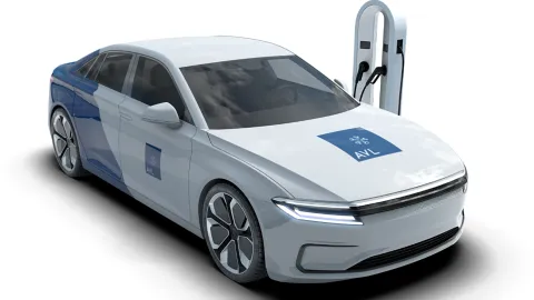 Electric vehicle plugged to a charger