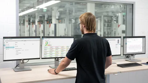 man in front of screen