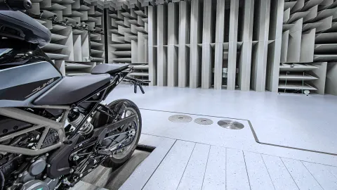 motorcycle in a chassis dyno NVH testbed