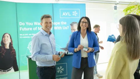 AVL Recruitment Fairs and Events - Experts in discussion in front of AVL booth