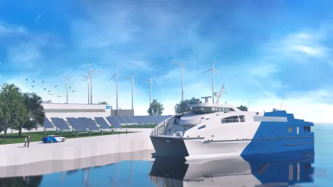 Blue and white ferry in the foreground on the water with solar panels on the dock to the right with wind turbines in the background