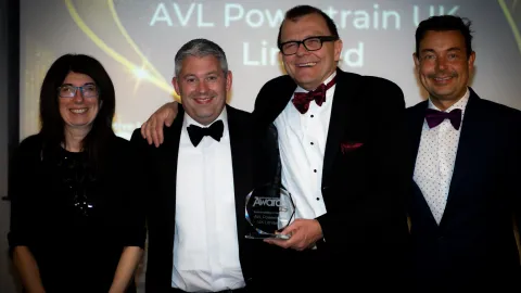 4 of AVL PTE UK's management team holding an award