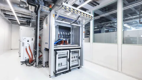 AVL inverter test system in laboratory environment with power electronics cabinets and integrated measurement equipment